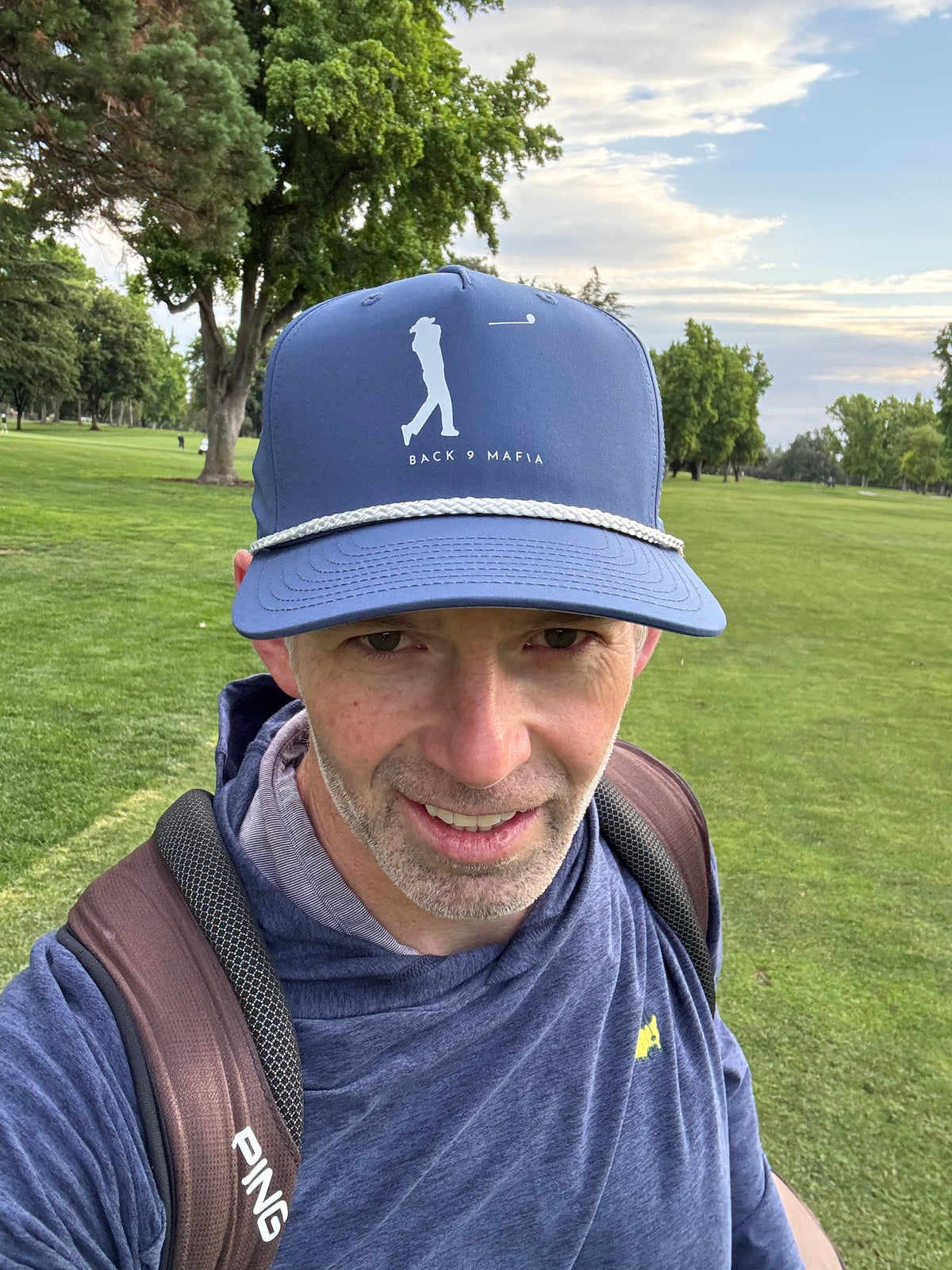 Mafia Rope Hat in light blue, worn walking the ninth